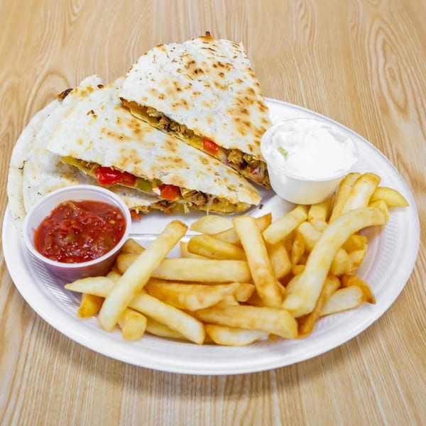 Chicken quesadillas with red peppers, served with fries, salsa, and sour cream on a white plate.