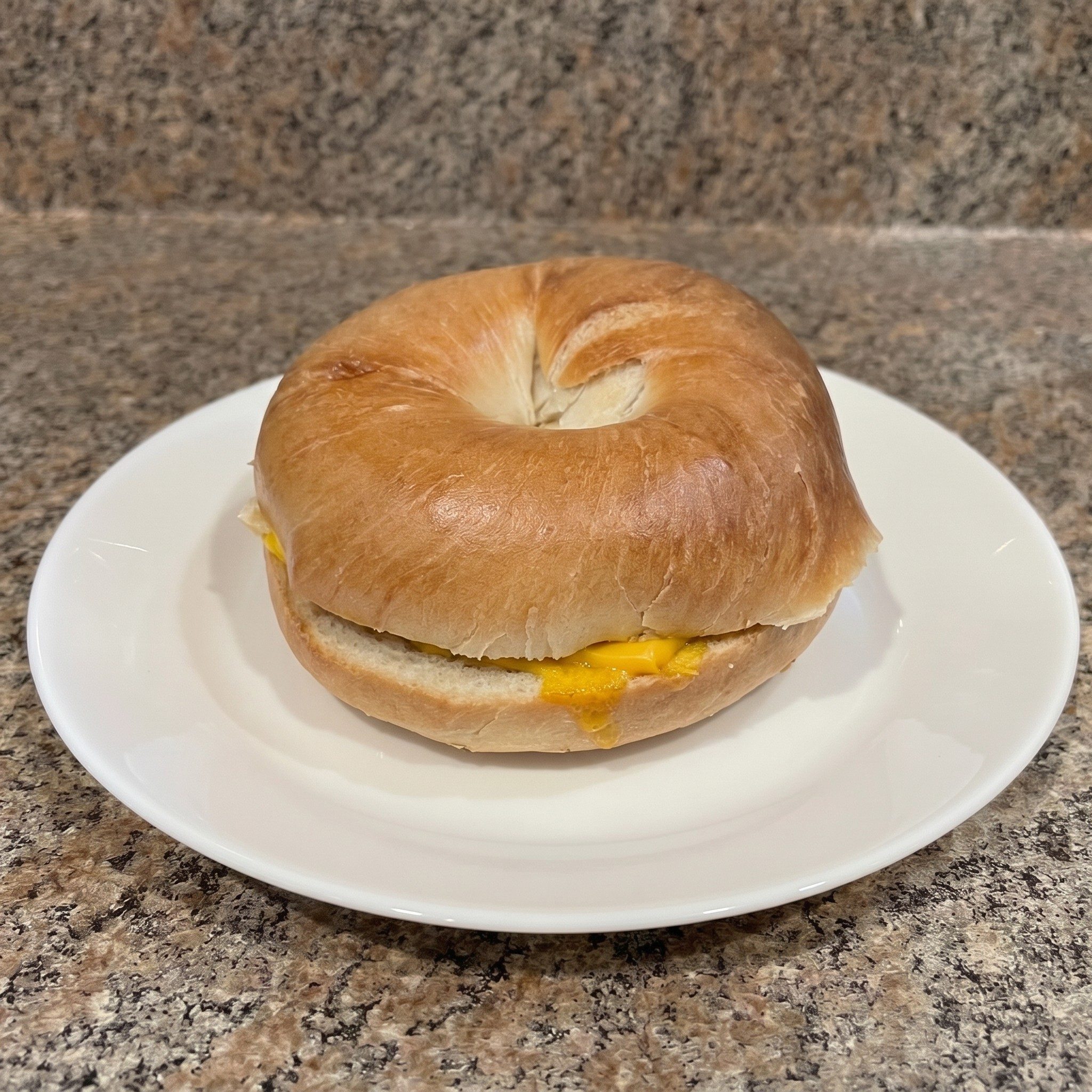 2 Eggs, Meat & Cheese Sandwich with Hash Browns.