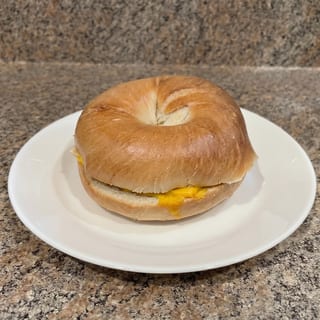 2 Eggs, Meat & Cheese Sandwich with Hash Browns