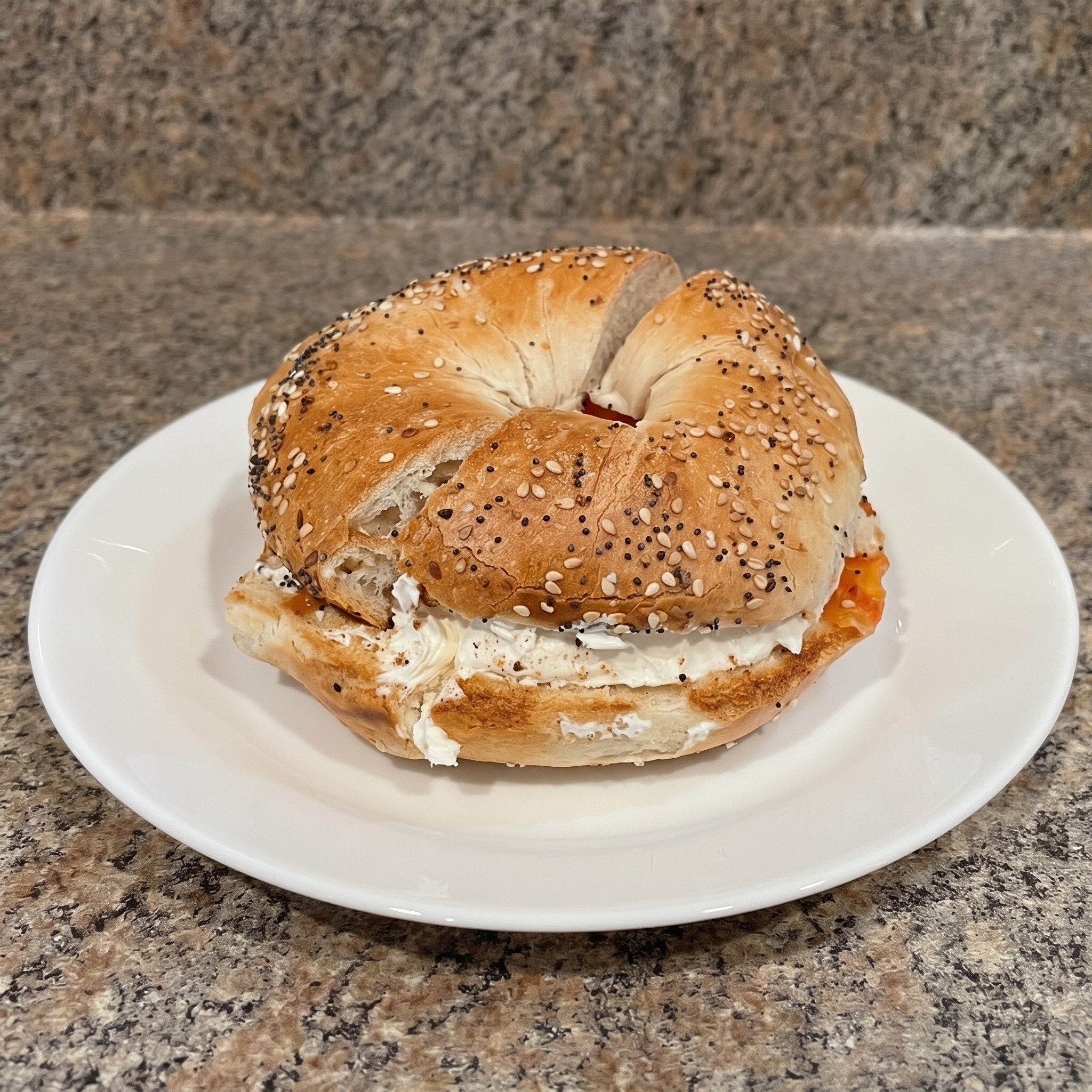 Nova Lox & Cream Cheese with Tomatoes & Onions Bagel.